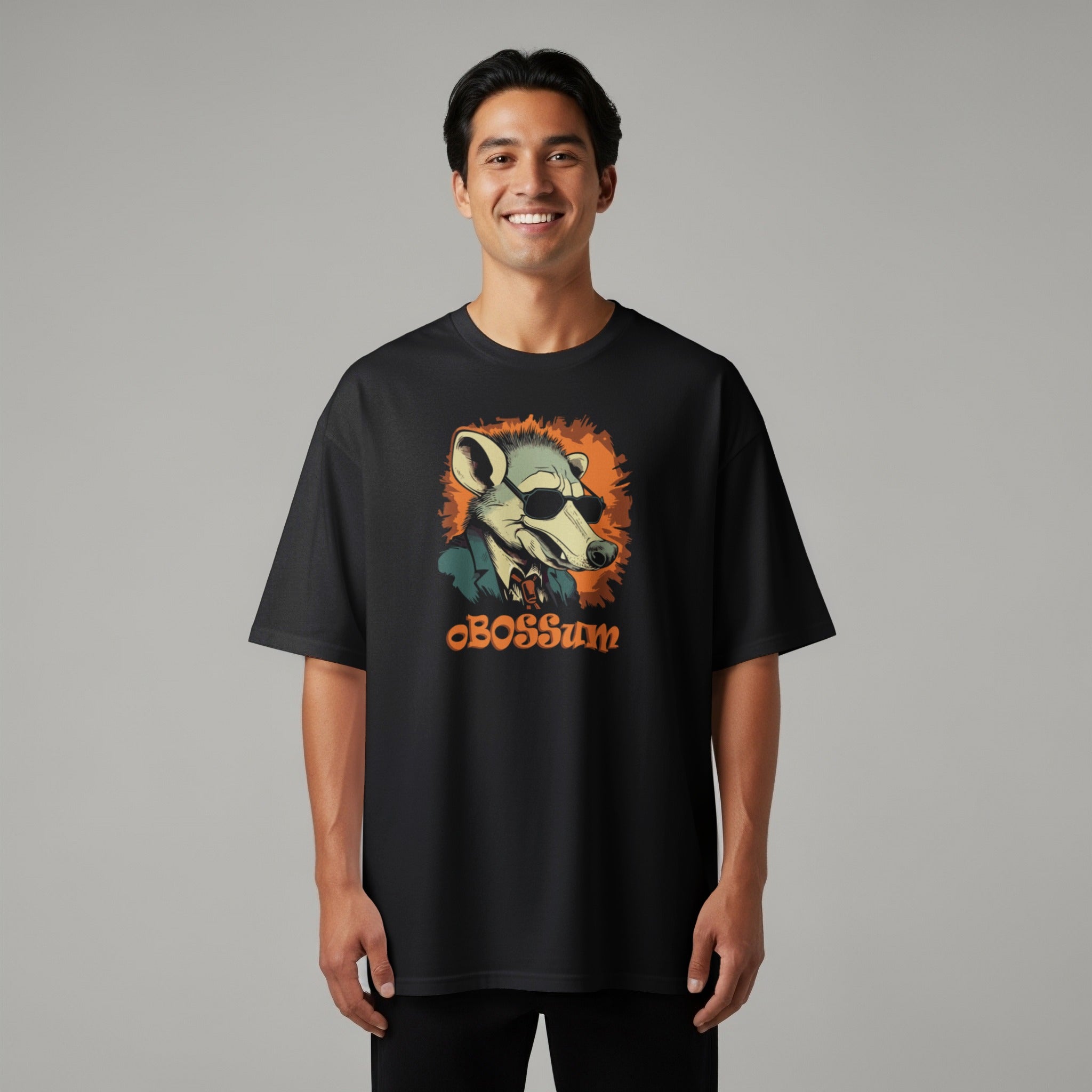 Black t-shirt featuring a cartoon possum wearing sunglasses and a suit with text "OBOSSum".