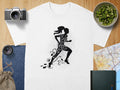 White t-shirt with black silhouette graphic of runner, text "Find Your Happy Pace".