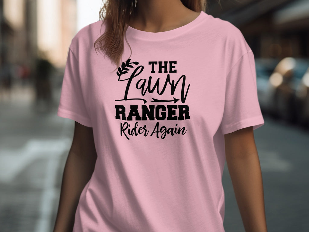 Pink t-shirt with black text "The Lawn Ranger Rider Again."