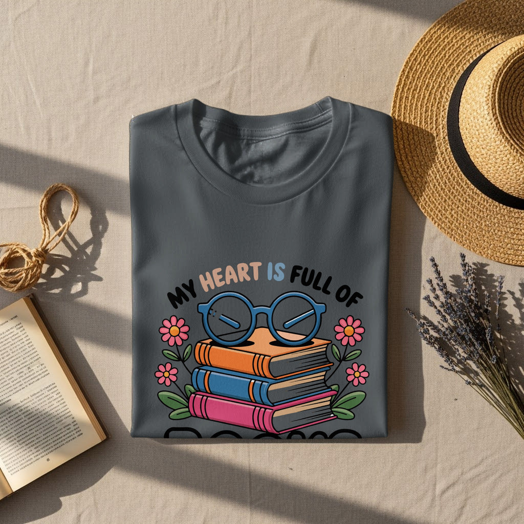Gray t-shirt with graphic of stacked books, glasses, flowers, and text "MY HEART IS FULL OF".