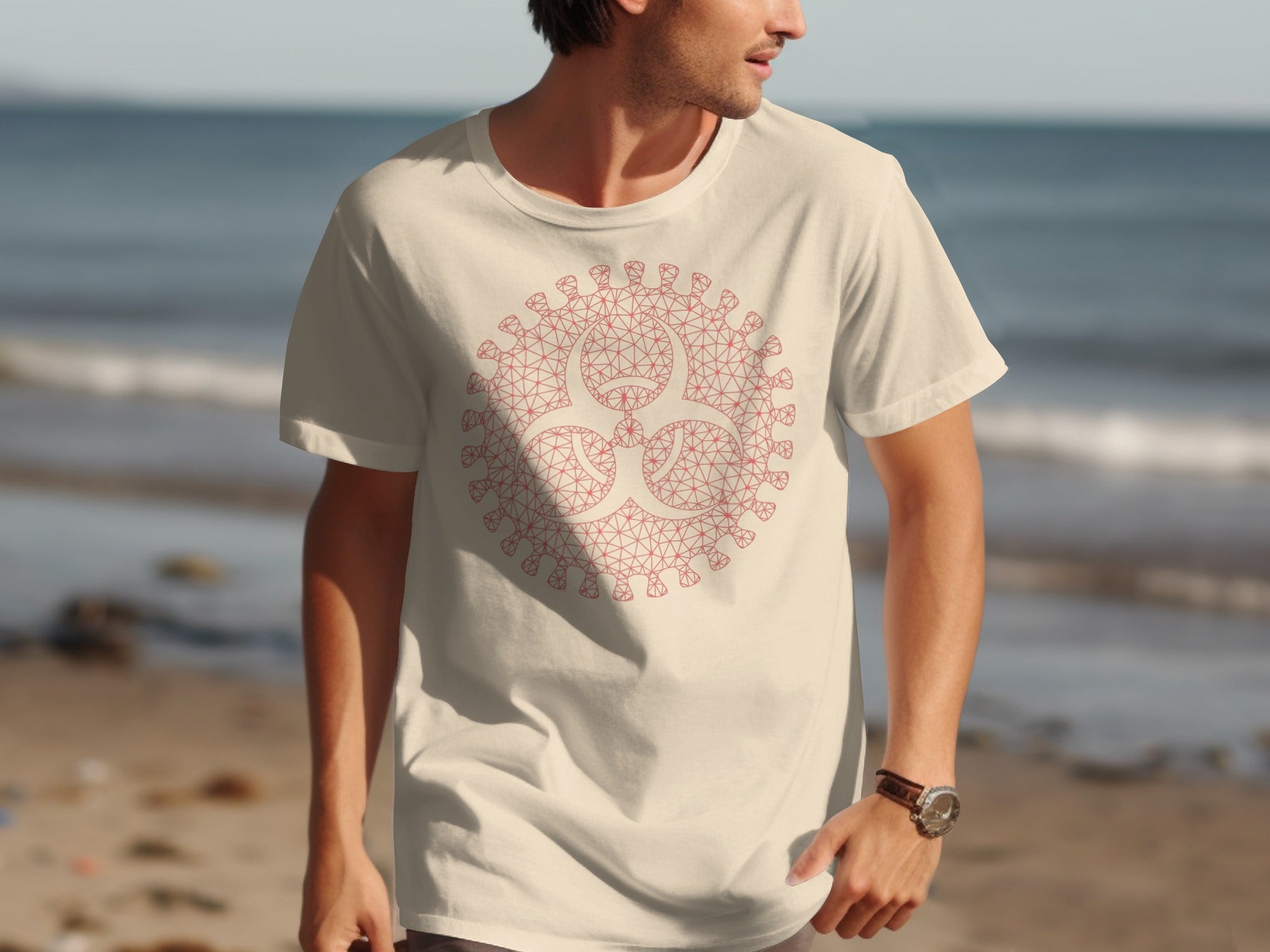Man wearing a light cream t-shirt with a pink biohazard symbol design.