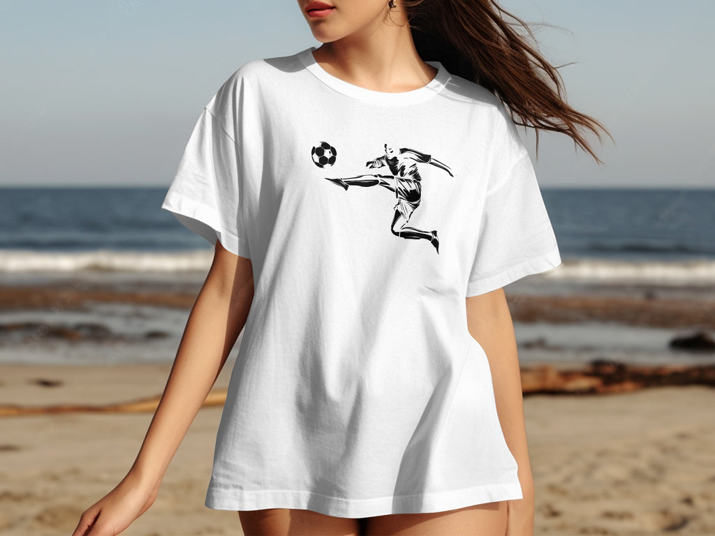 White t-shirt with black graphic of a soccer player kicking a ball.