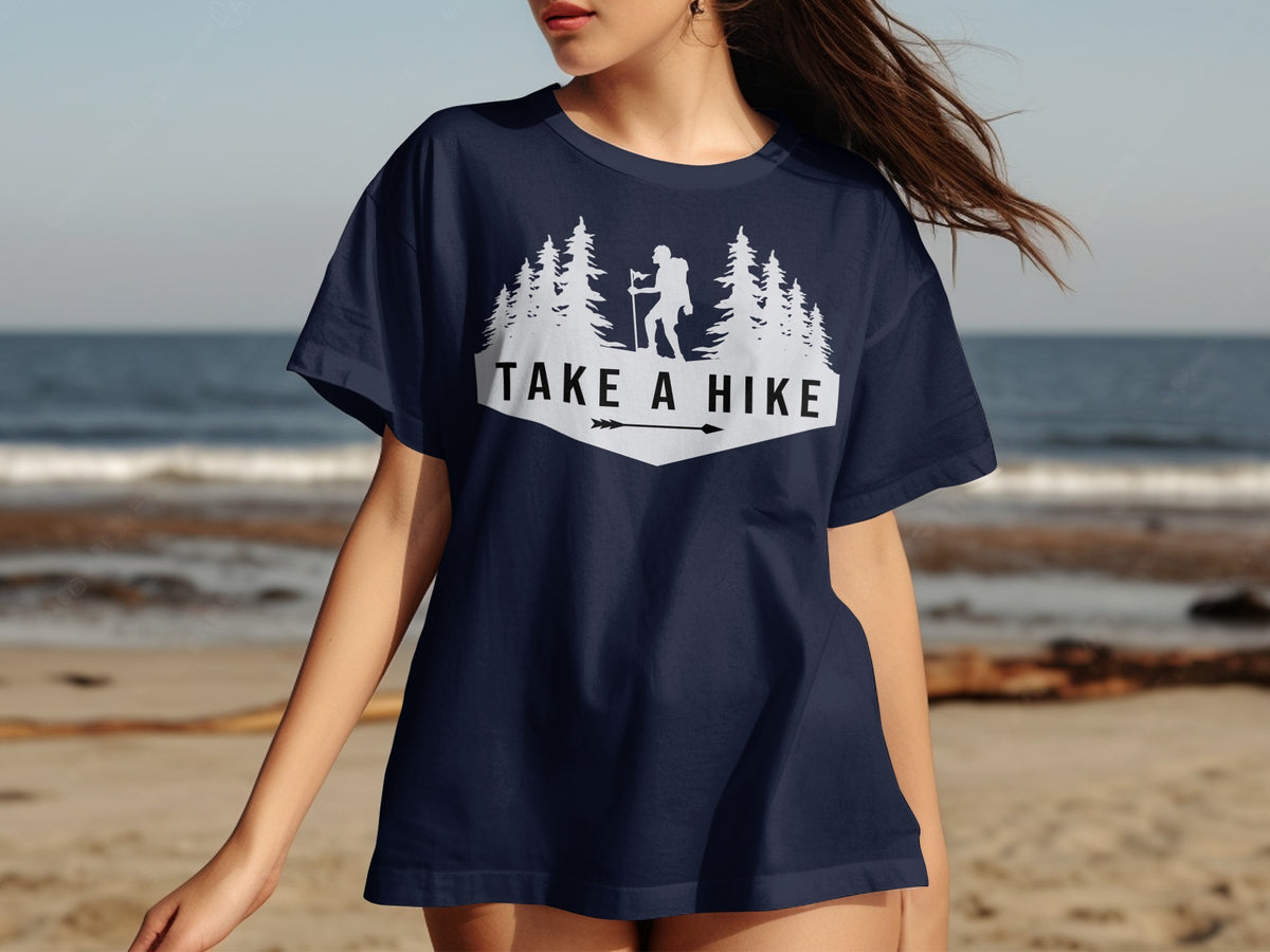 Navy t-shirt with white "TAKE A HIKE" text and mountain landscape graphic.