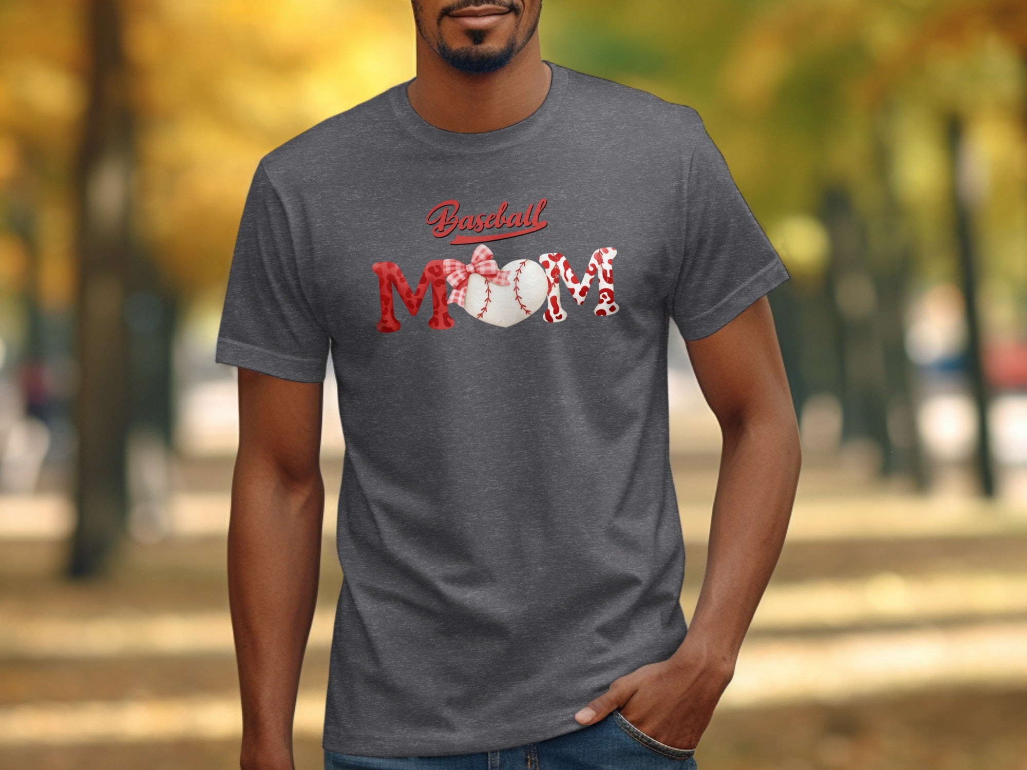 Baseball Mom text with baseball heart graphic on dark grey t-shirt.