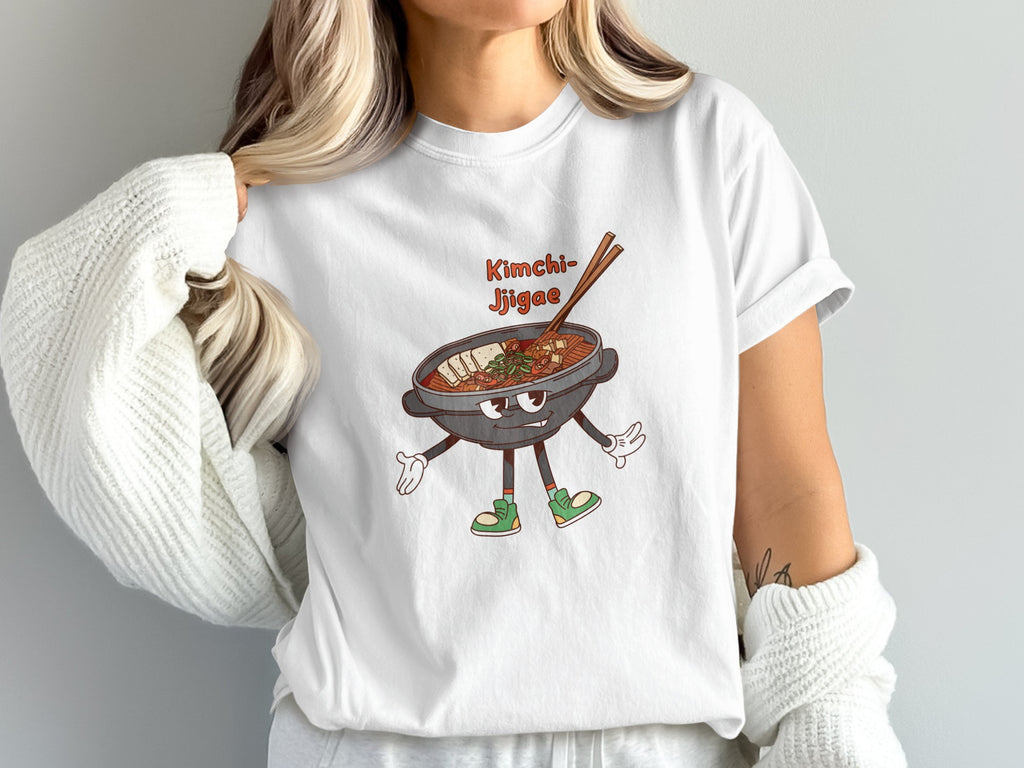 White t-shirt with cartoon Kimchi Jjigae and chopsticks graphic.