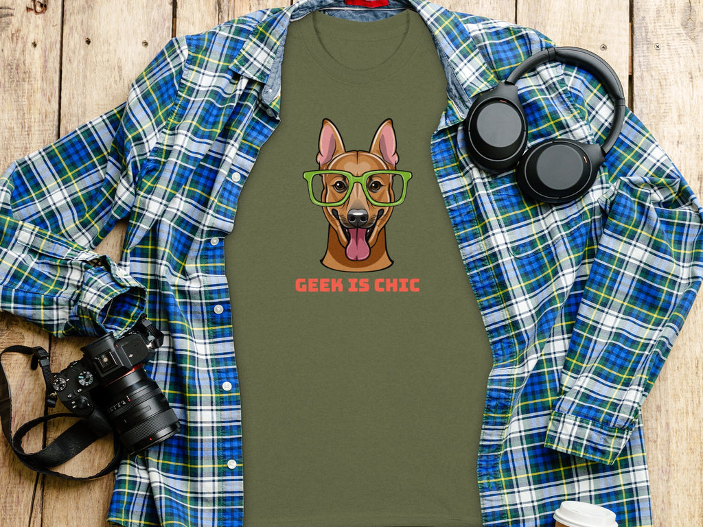 Green t-shirt with cartoon dog wearing glasses, text "GEEK IS CHIC".