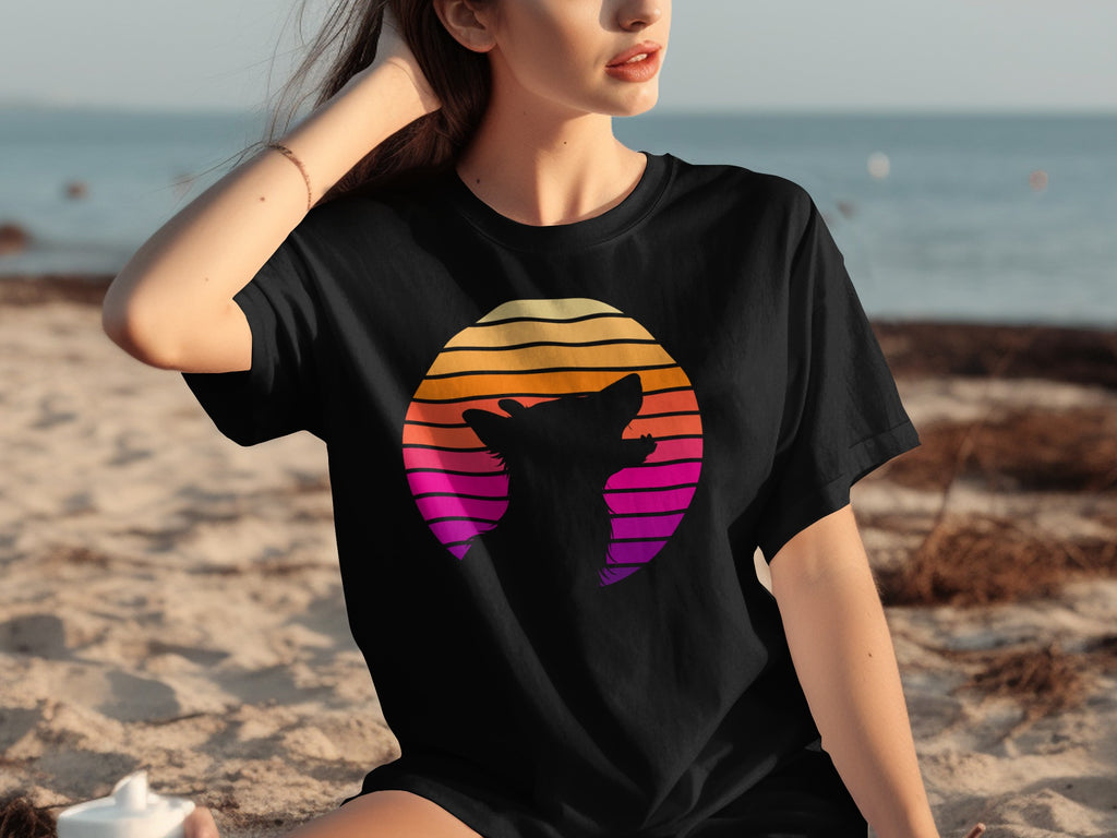 Black t-shirt featuring a silhouette of a dog against a retro sunset graphic.