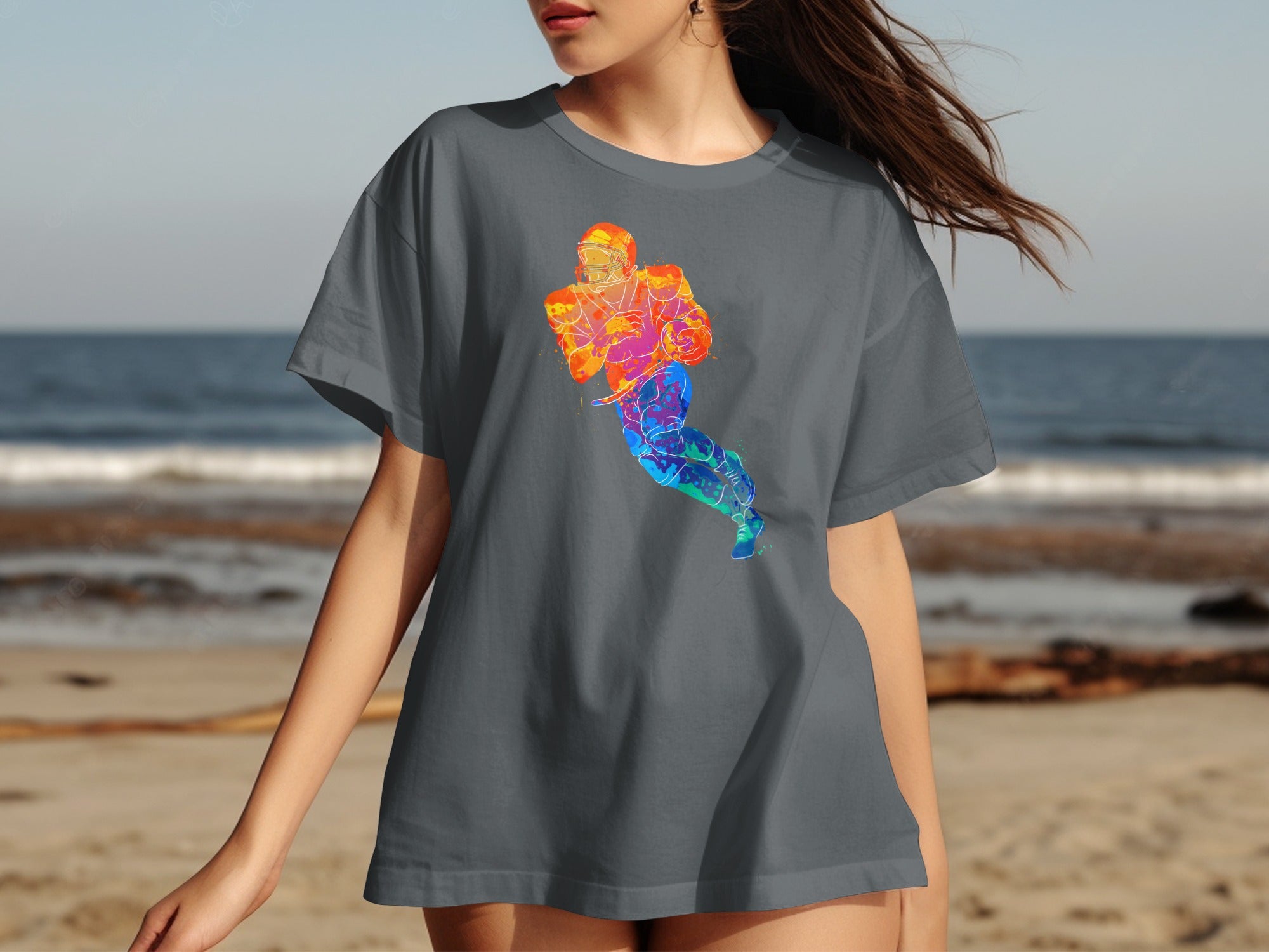 Gray t-shirt with a colorful watercolor football player graphic on the front.