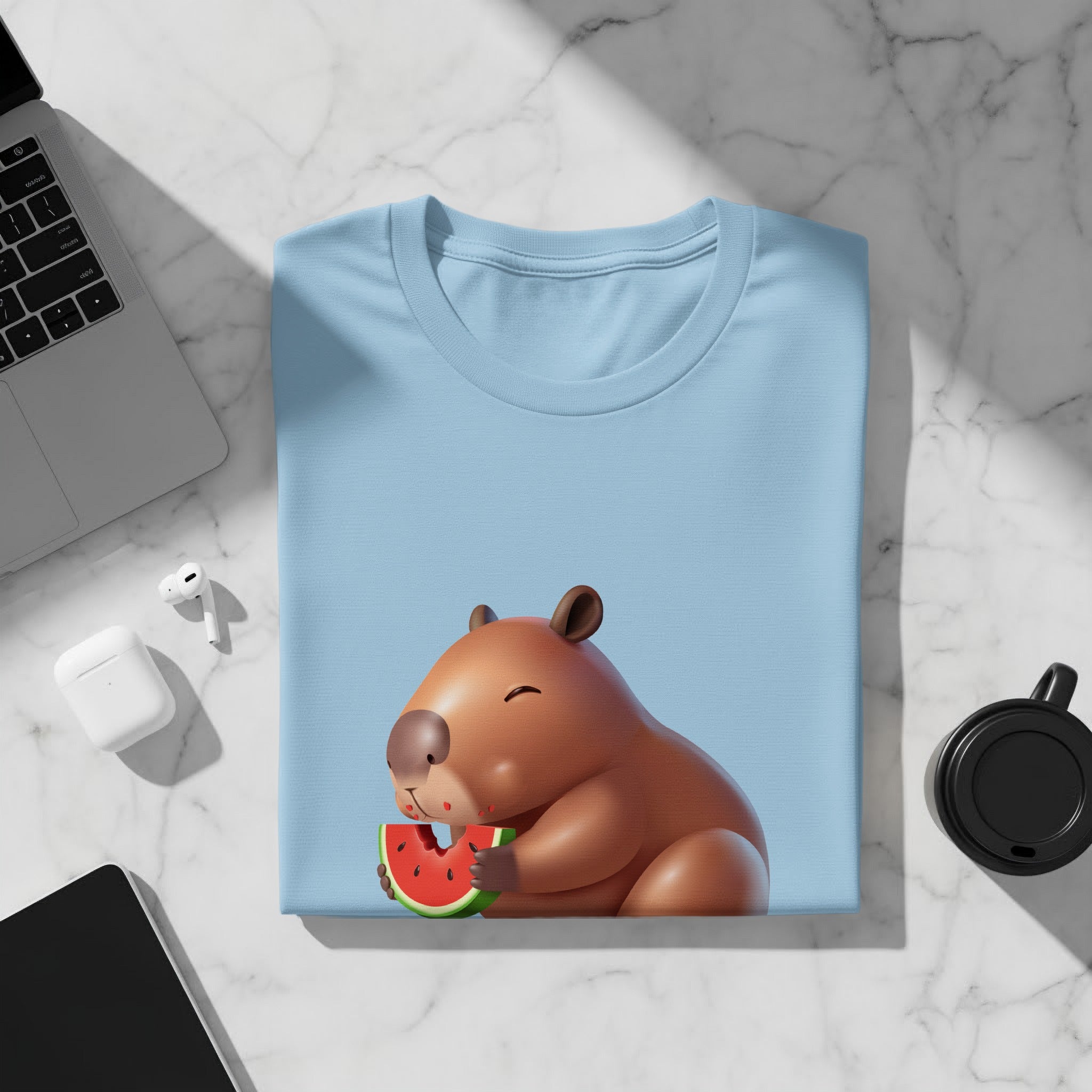 Light blue t-shirt with a cartoon capybara eating watermelon design.