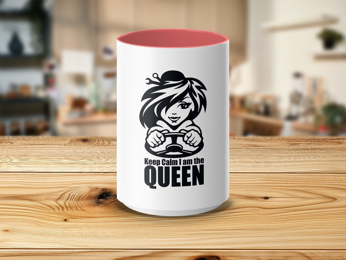 White mug with black "Keep Calm I am the QUEEN" text and cartoon driver graphic.