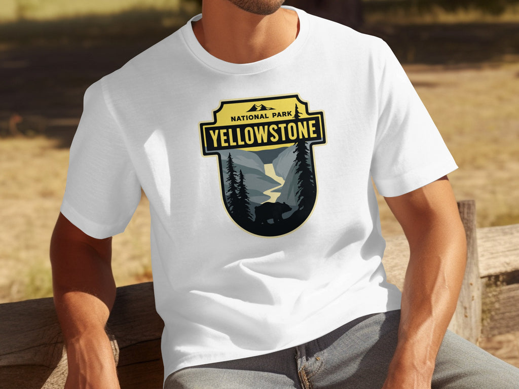 White t-shirt with Yellowstone National Park crest featuring a bear and mountain scene.