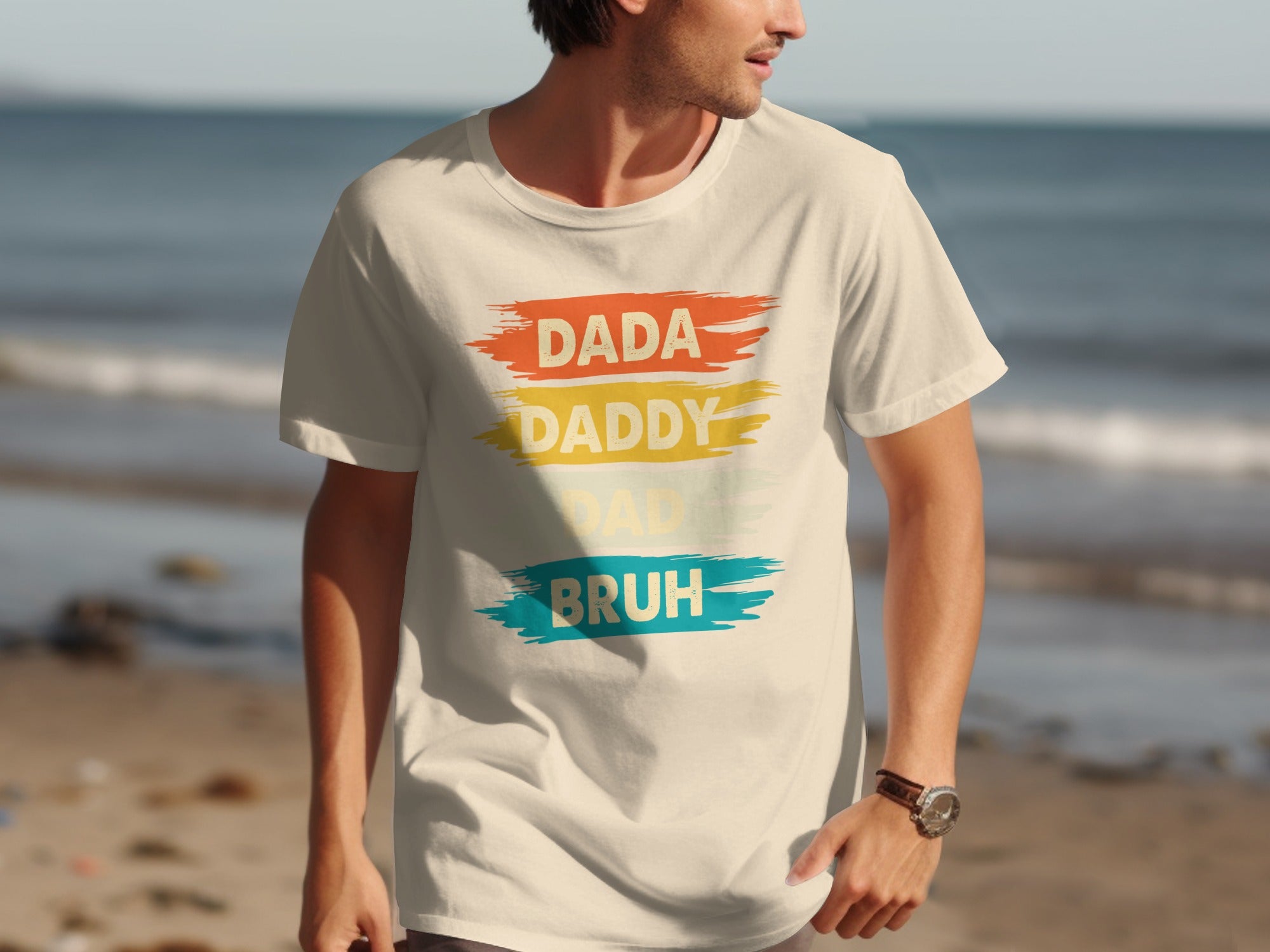 Cream t-shirt with distressed text: Dada, Daddy, Dad, Bruh.