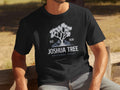 Black t-shirt with Joshua Tree National Park logo featuring a silhouette and text.