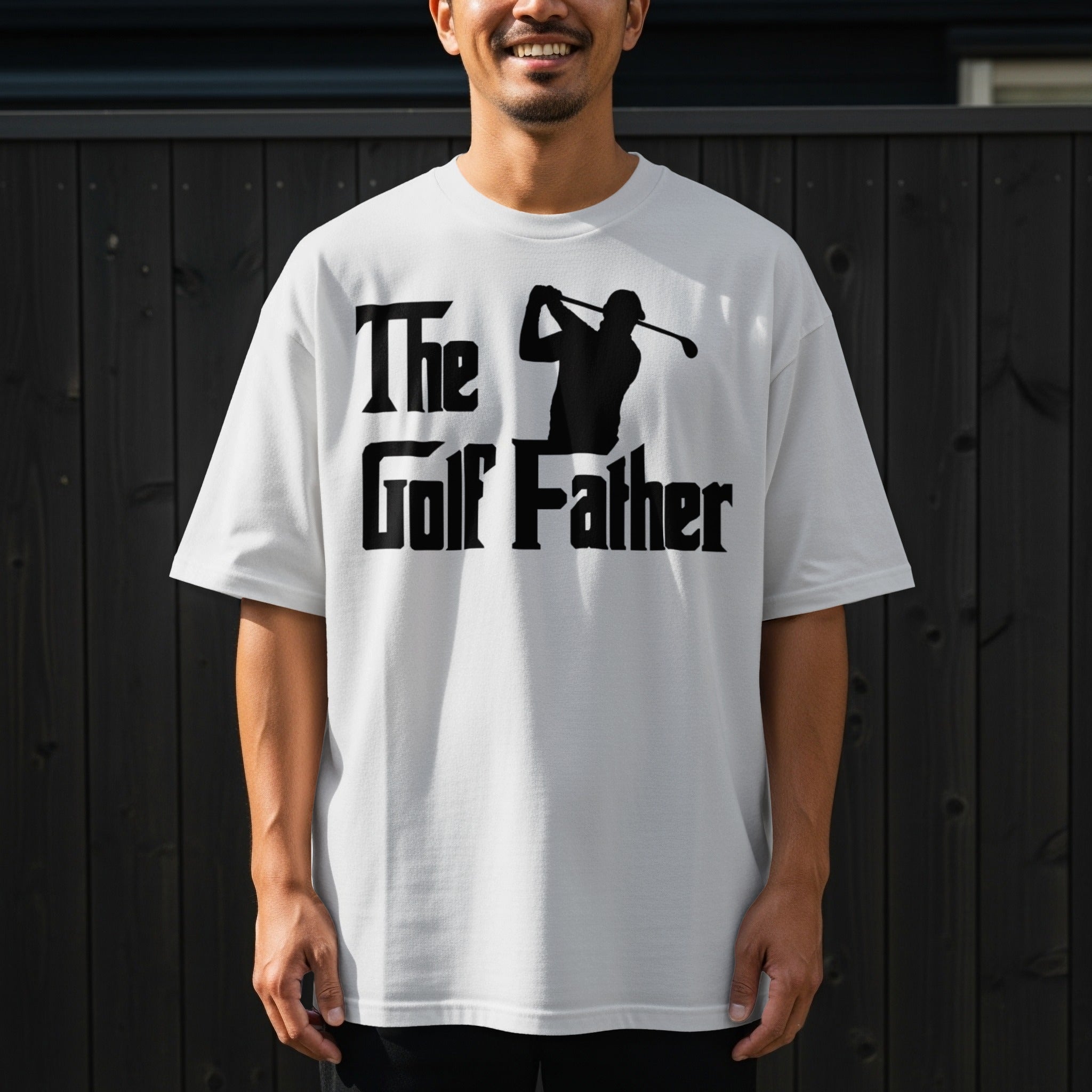 White t-shirt with "The Golf Father" and golfer silhouette print.