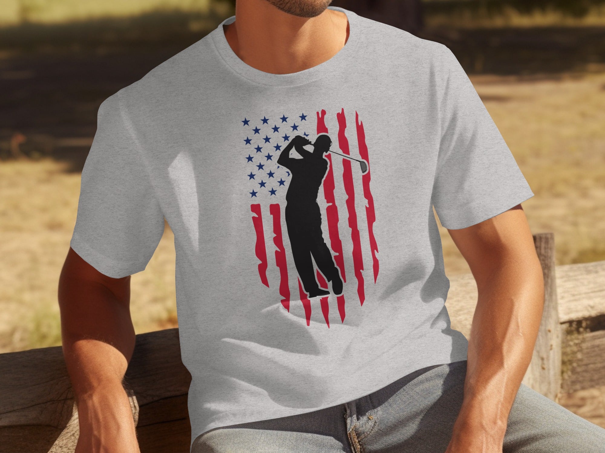 Grey t-shirt with a distressed American flag graphic and a golfer silhouette.