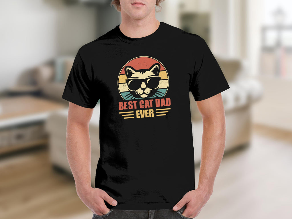 Black t-shirt with cat wearing sunglasses graphic and text "BEST CAT DAD EVER".