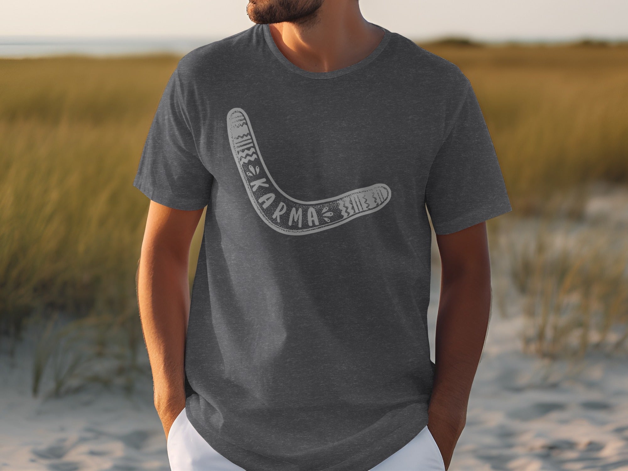 Charcoal grey t-shirt with a white boomerang graphic and the word KARMA.
