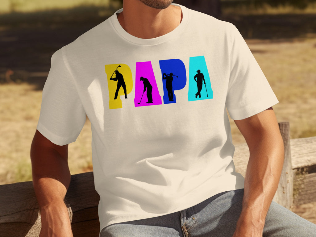 Cream t-shirt with "PAPA" text, featuring golfer silhouettes.