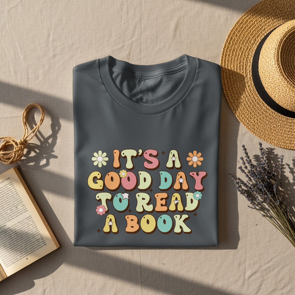 Gray t-shirt with "It's a good day to read a book" text in colorful bubbles.
