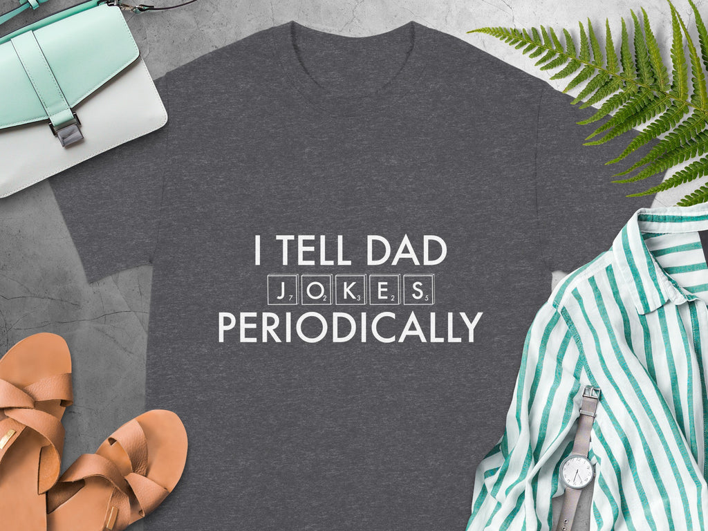 Dark grey t-shirt with white text "I TELL DAD JOKES PERIODICALLY".