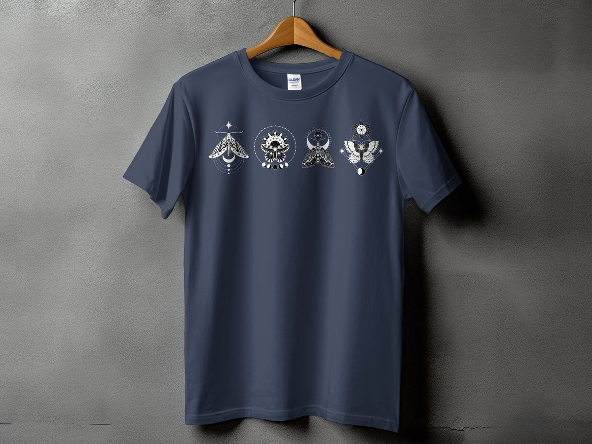 Dark blue t-shirt with four white celestial moth and sun designs across the chest.