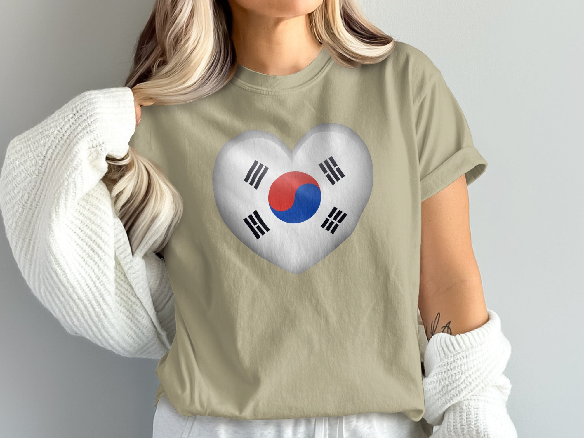 Beige t-shirt with South Korea flag in a heart shape on the chest.