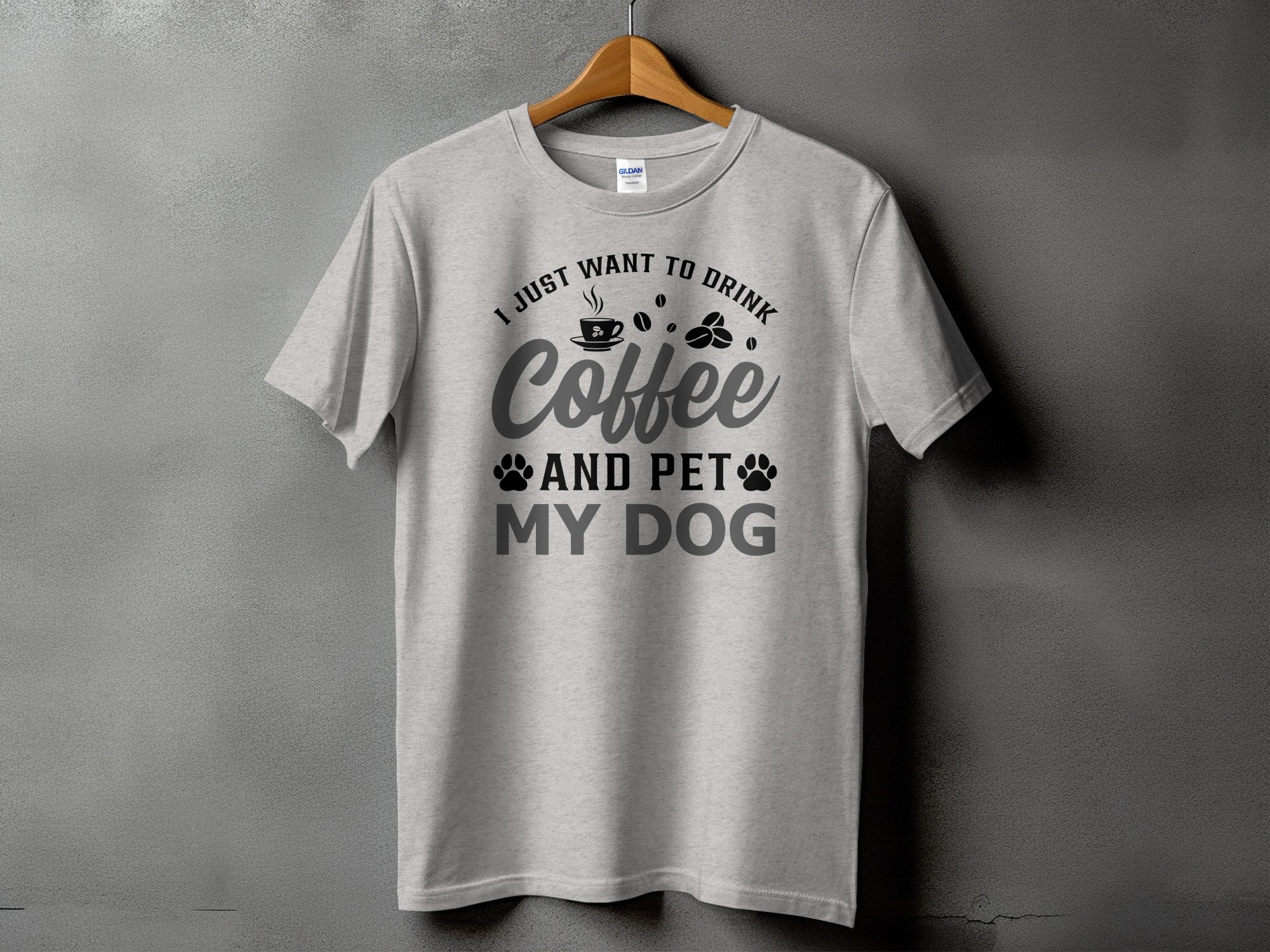 Light grey t-shirt with black text that reads "I JUST WANT TO DRINK Coffee AND PET MY DOG".
