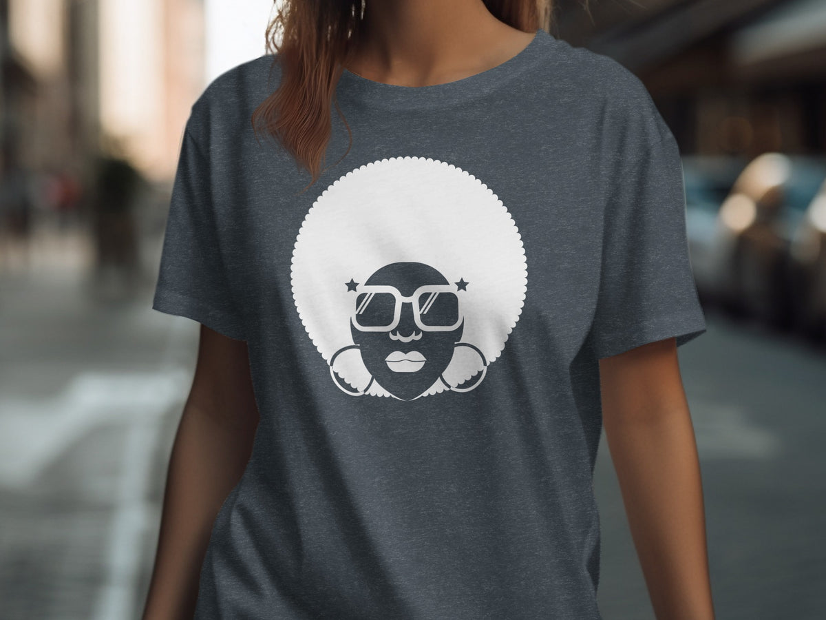 Dark grey t-shirt with white graphic of a woman with an afro and sunglasses.