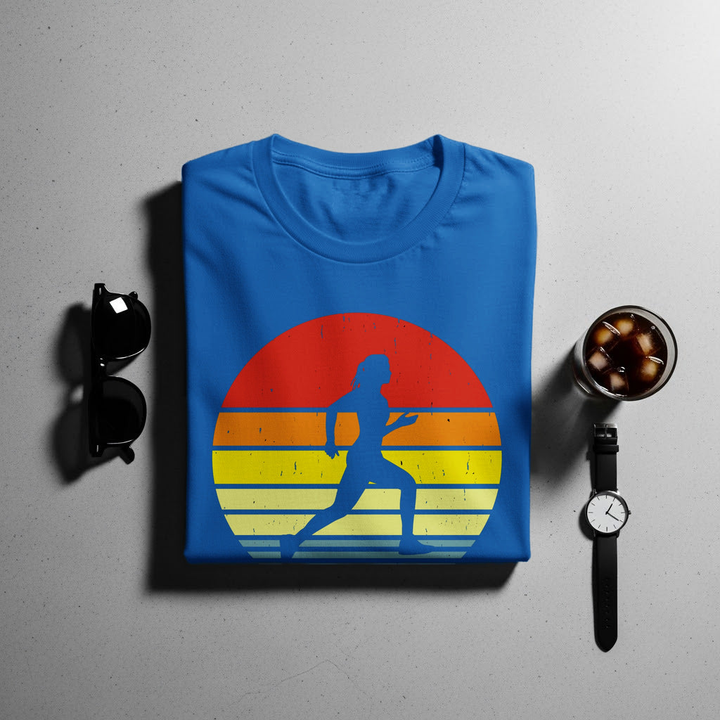 Blue t-shirt with retro runner graphic and striped sunset design.