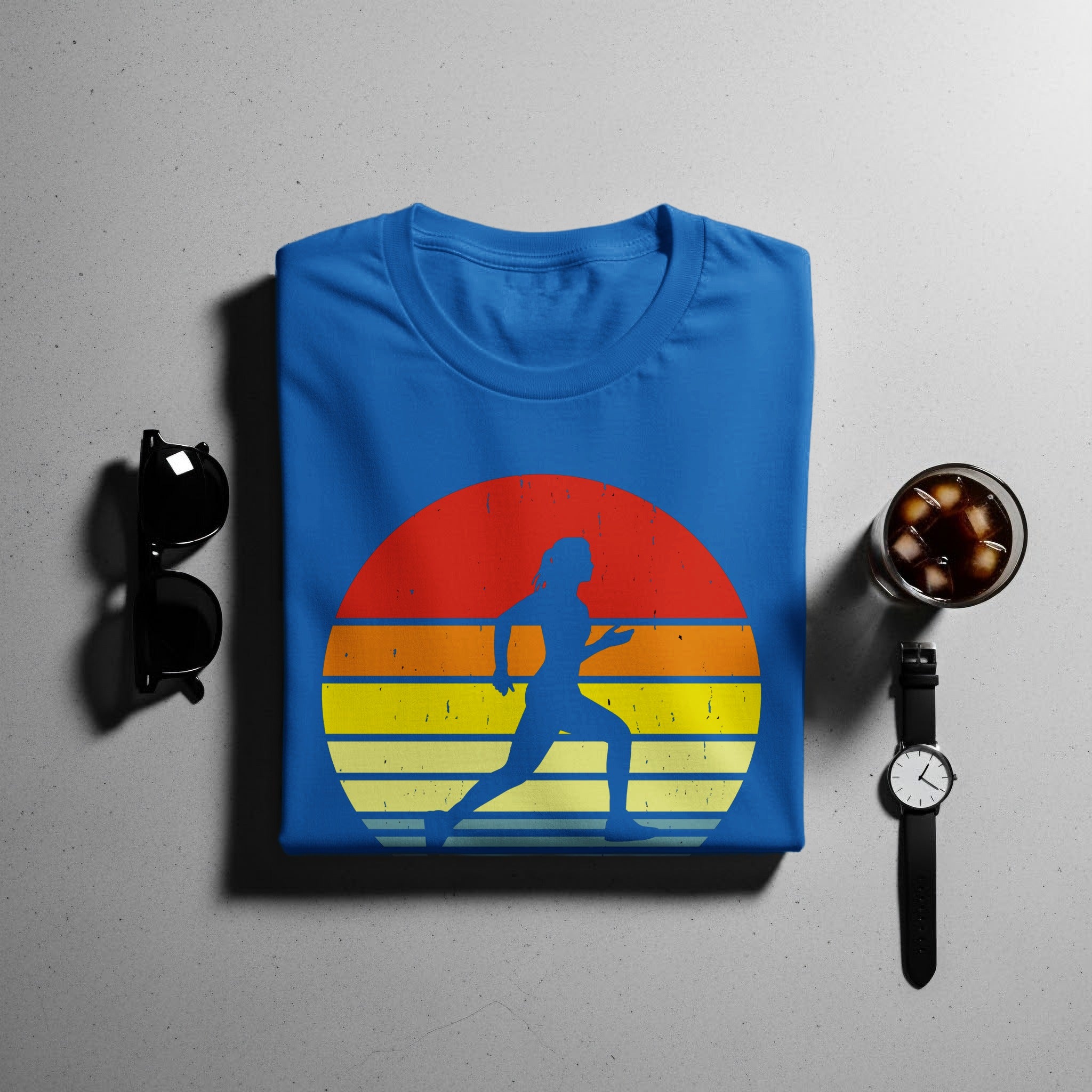 Blue t-shirt with retro runner graphic and striped sunset design.