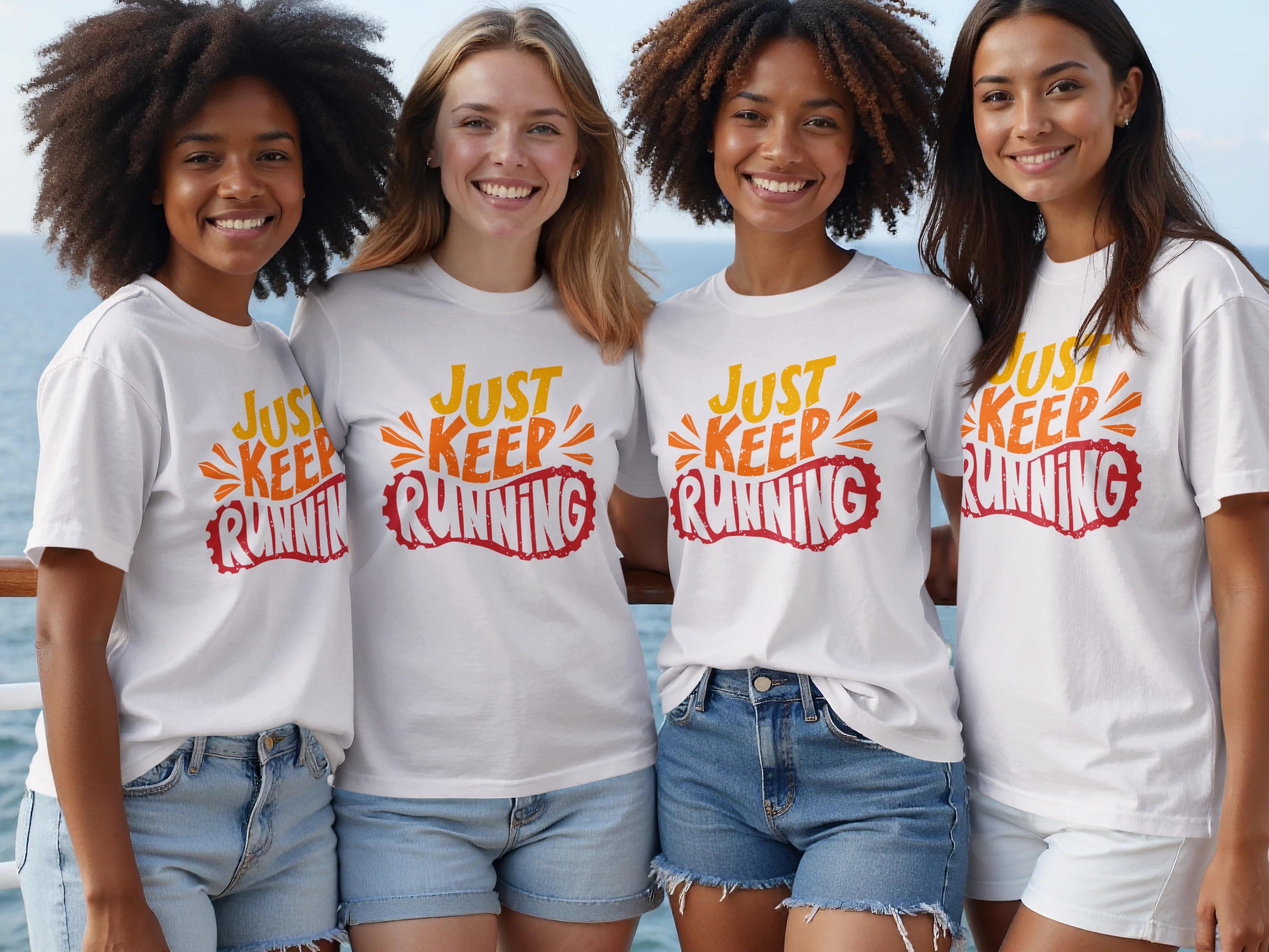 Four smiling women wear white t-shirts with "JUST KEEP RUNNING" graphic.