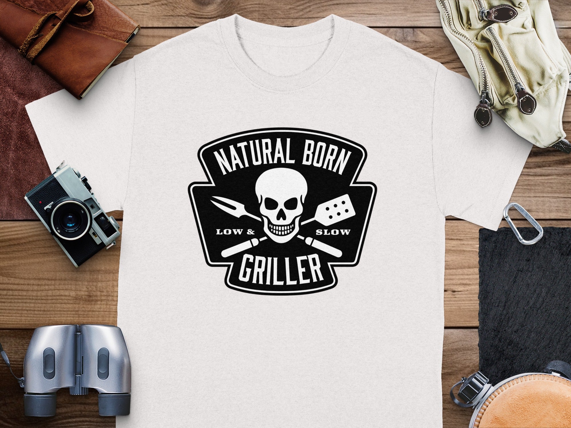 White t-shirt with "Natural Born Griller" and skull graphic.