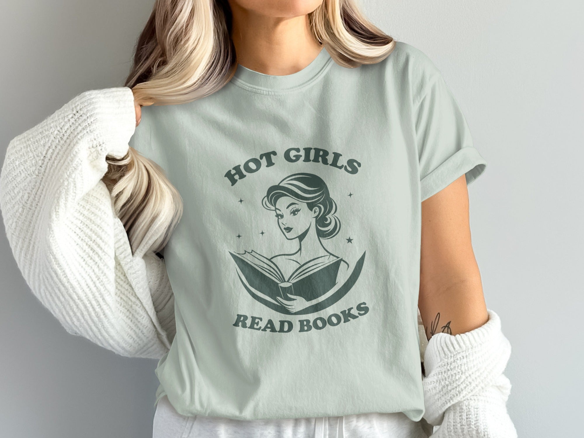 Light green t-shirt with "Hot Girls Read Books" text and a graphic of a woman reading.