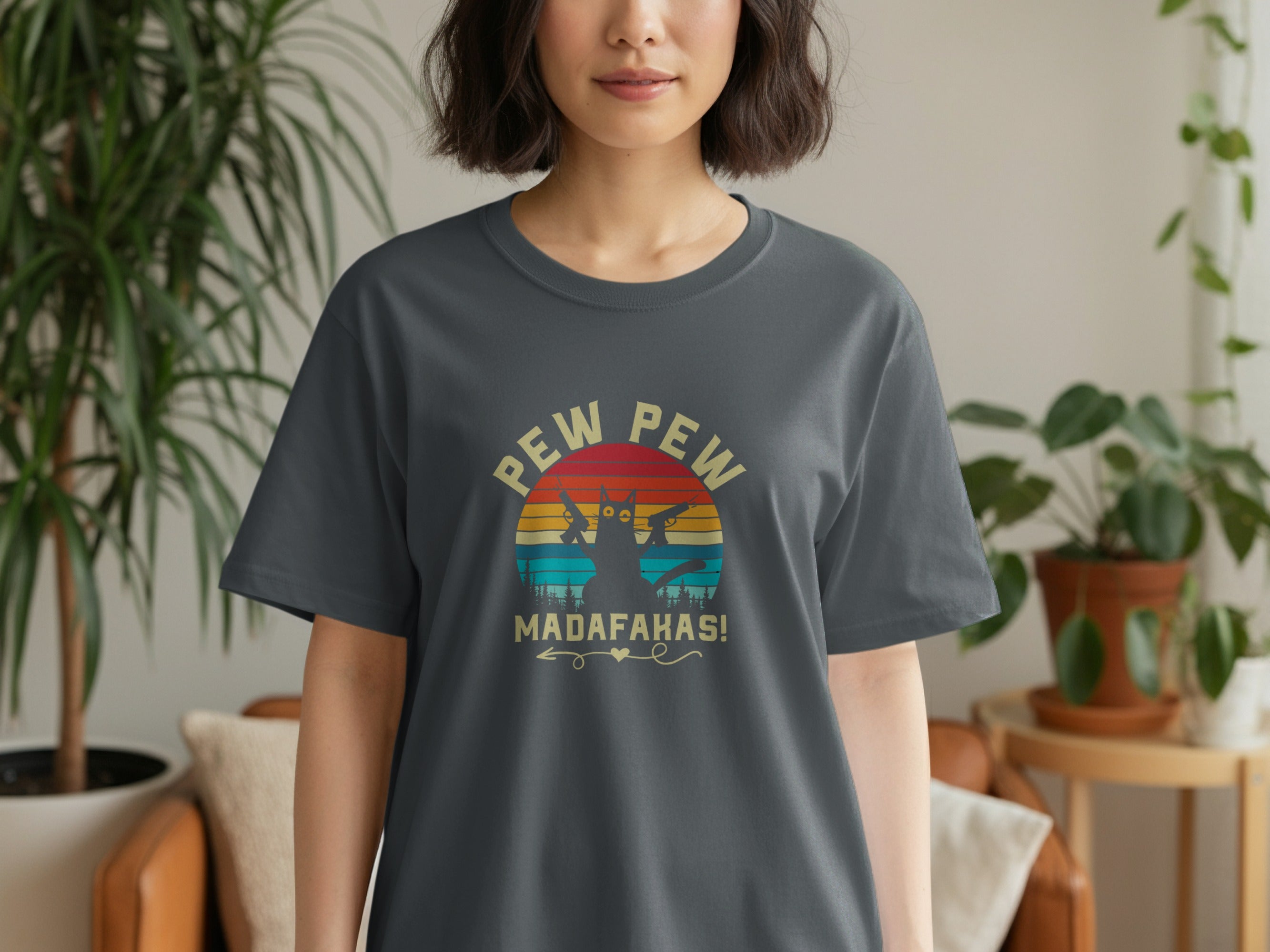 Grey t-shirt with "Pew Pew Madafakas!" text and silhouette of cat holding guns.