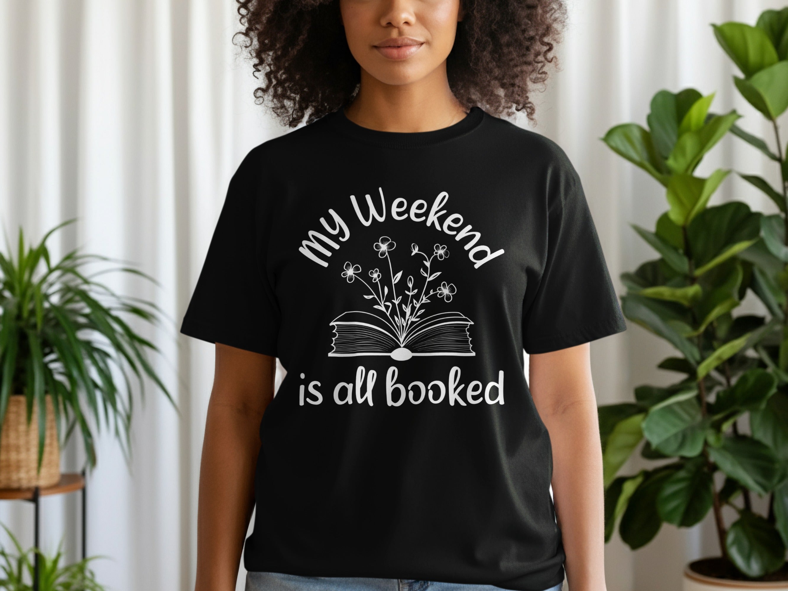 Black t-shirt with white text and graphic reading "my Weekend is all booked."
