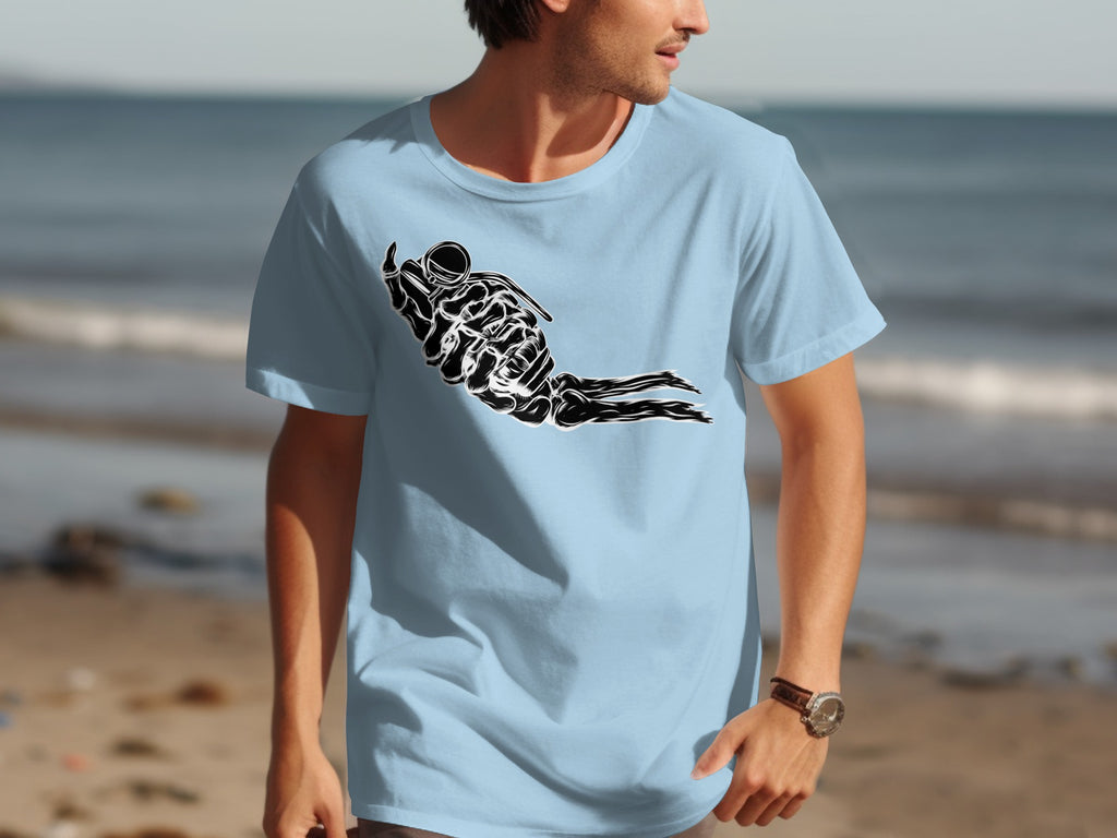 Light blue t-shirt with black graphic of skeleton hand holding grenade on beach background.