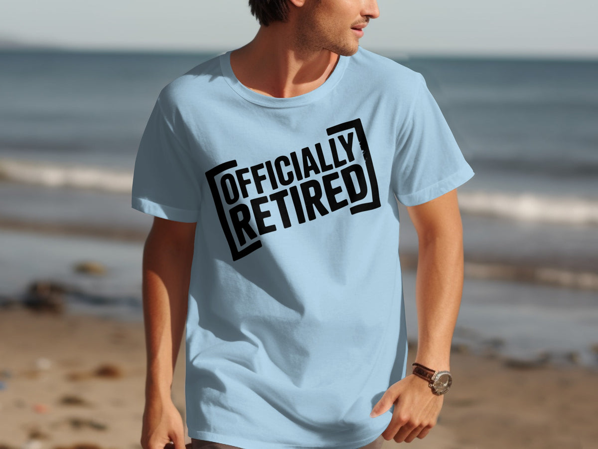 Light blue t-shirt with black text that reads "OFFICIALLY RETIRED".