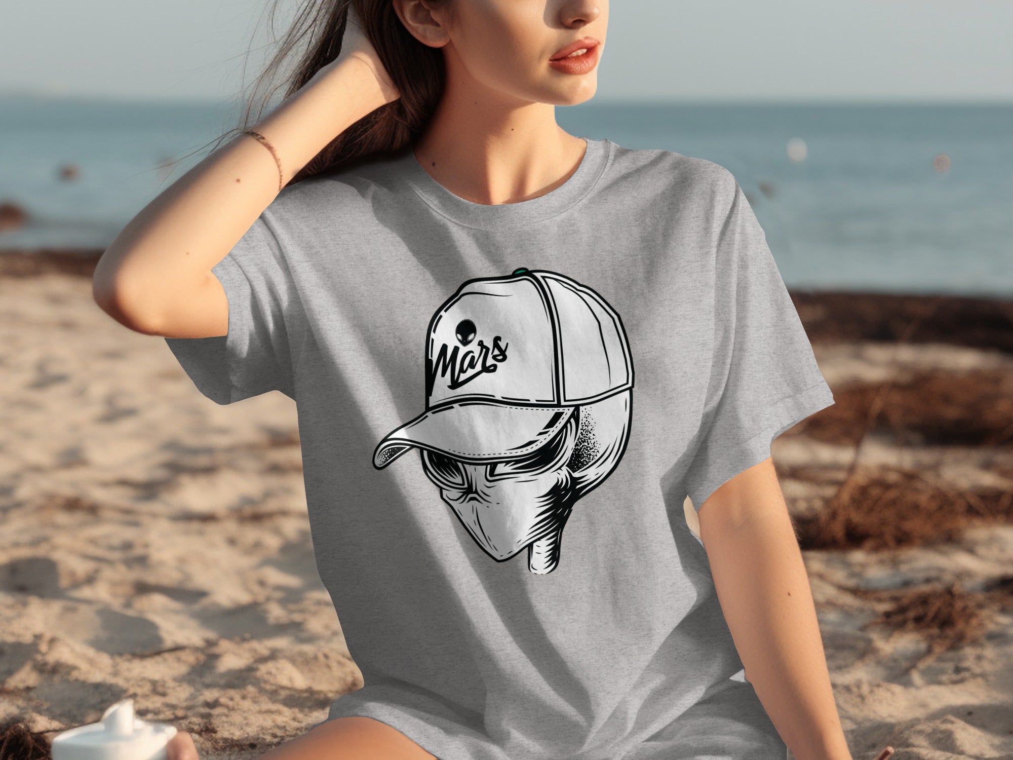 Grey t-shirt with alien wearing a baseball cap that says "Mars".