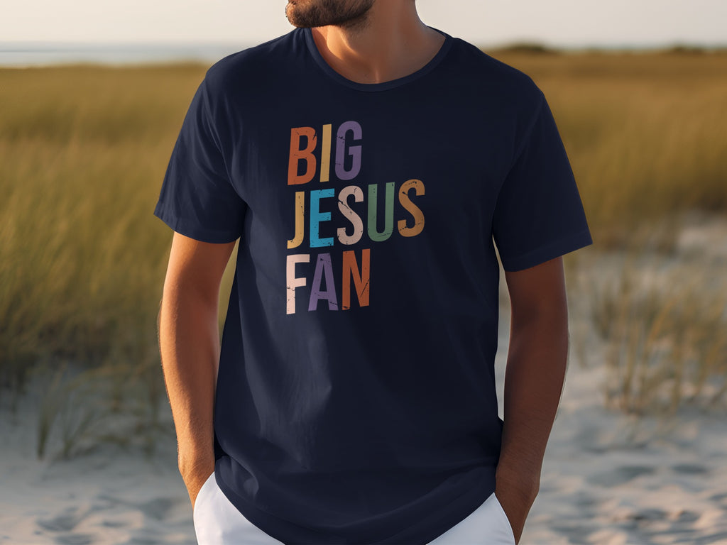 Navy t-shirt with "BIG JESUS FAN" text in colorful distressed letters.