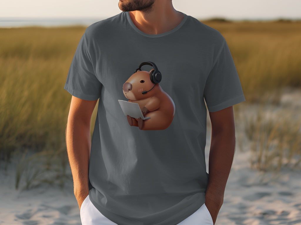 Capybara with headphones and laptop graphic on a gray t-shirt.