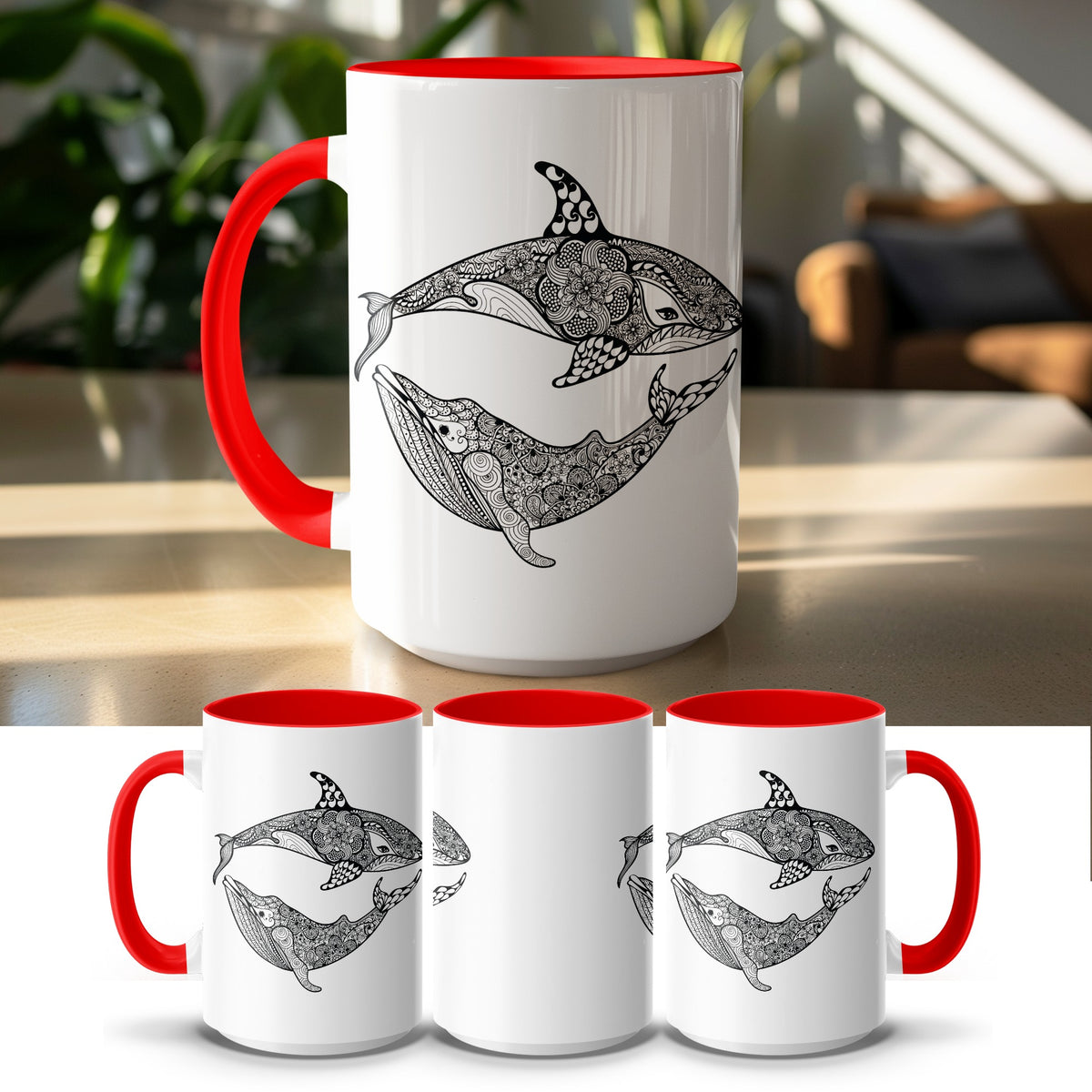White mug with red handle, featuring ornate black whale and orca designs.