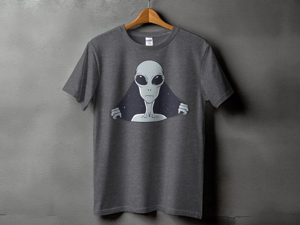 Grey t-shirt with a graphic of an alien peeking through a starry space.