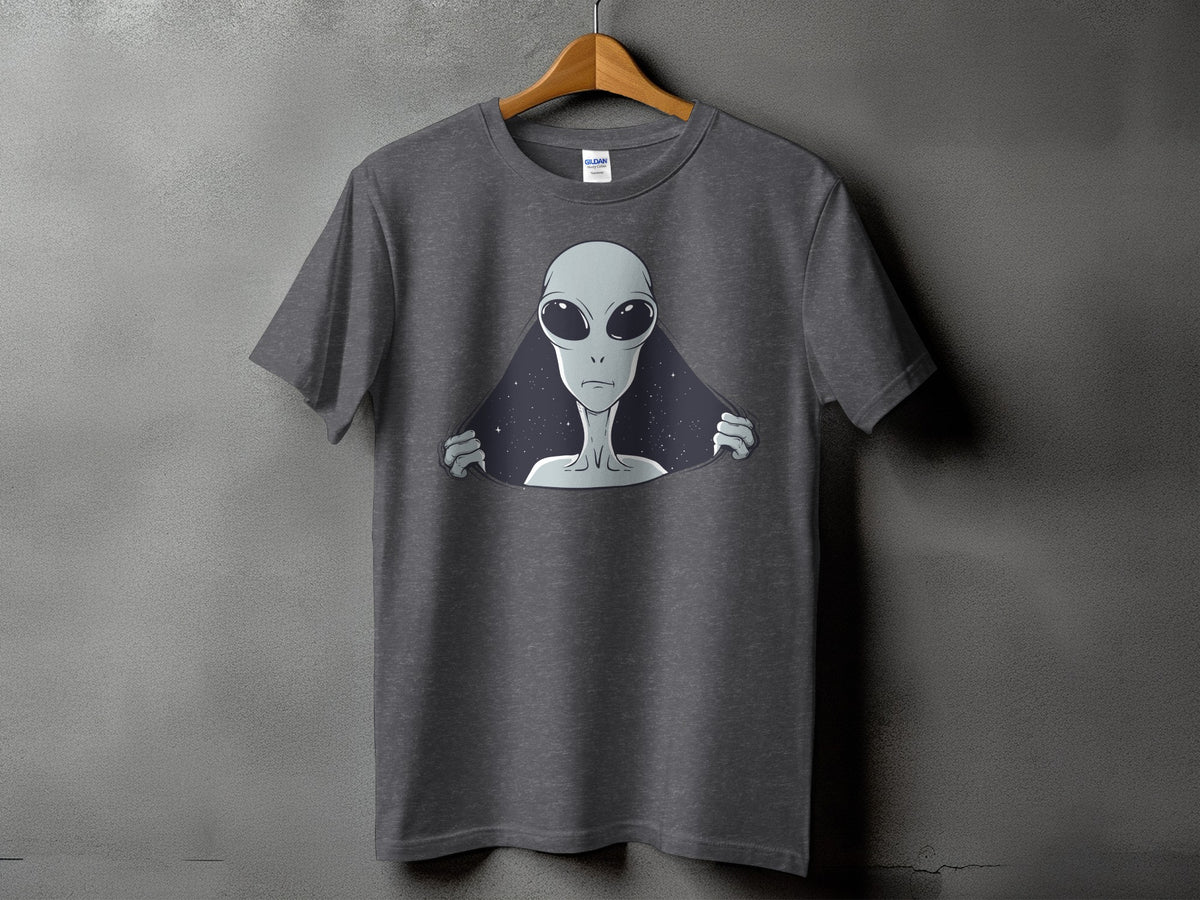 Grey t-shirt with a graphic of an alien peeking through a starry space.