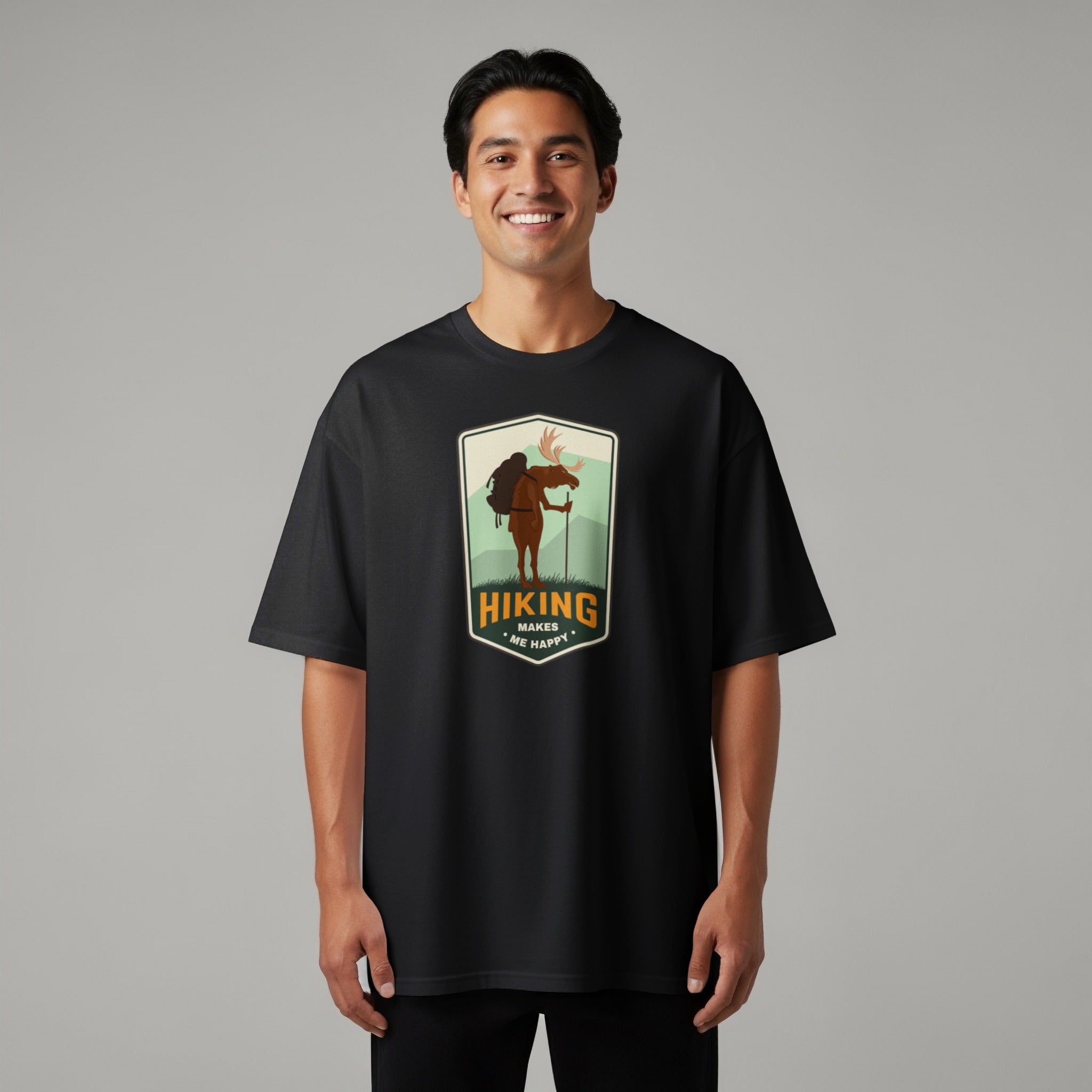 T-shirt with a hiking moose graphic and the text "Hiking Makes Me Happy".