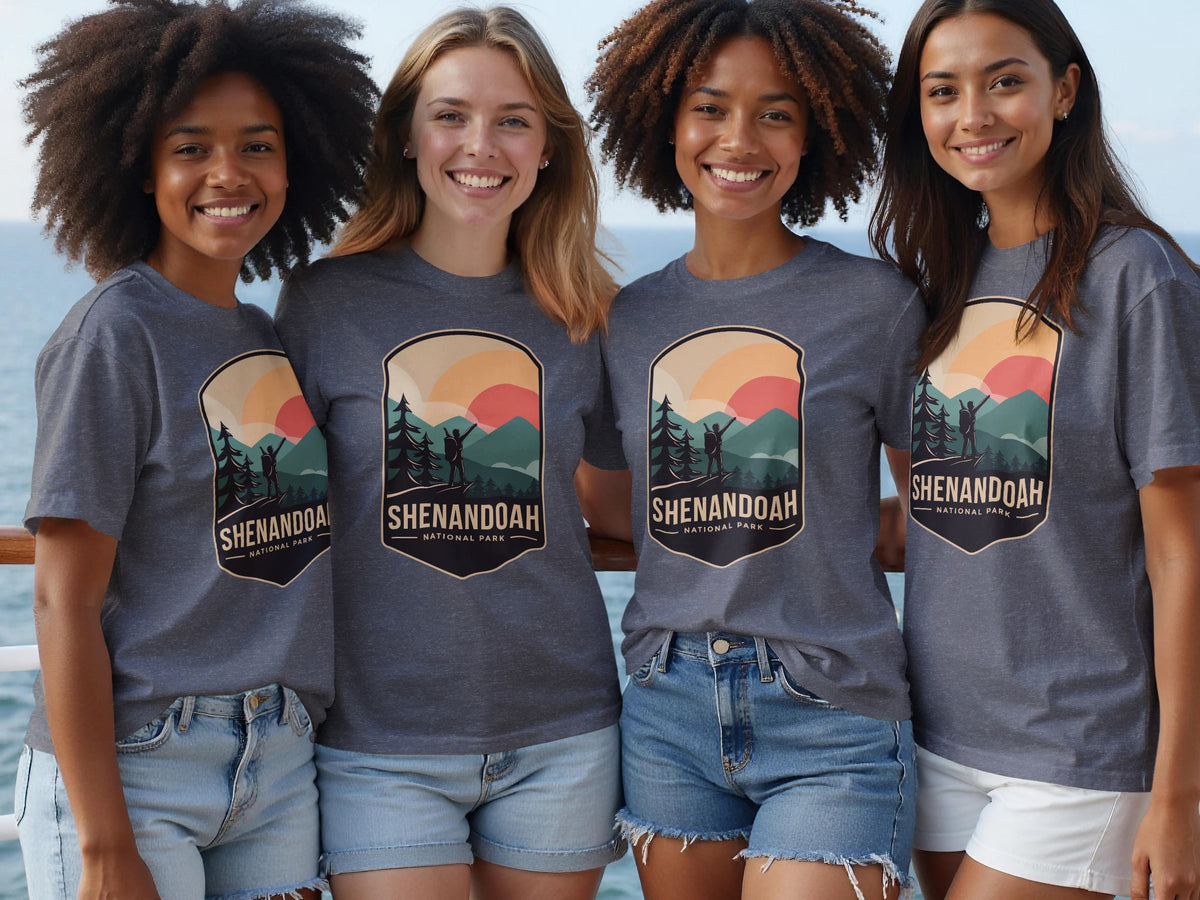 Four women in gray t-shirts with a Shenandoah National Park graphic, standing outdoors.