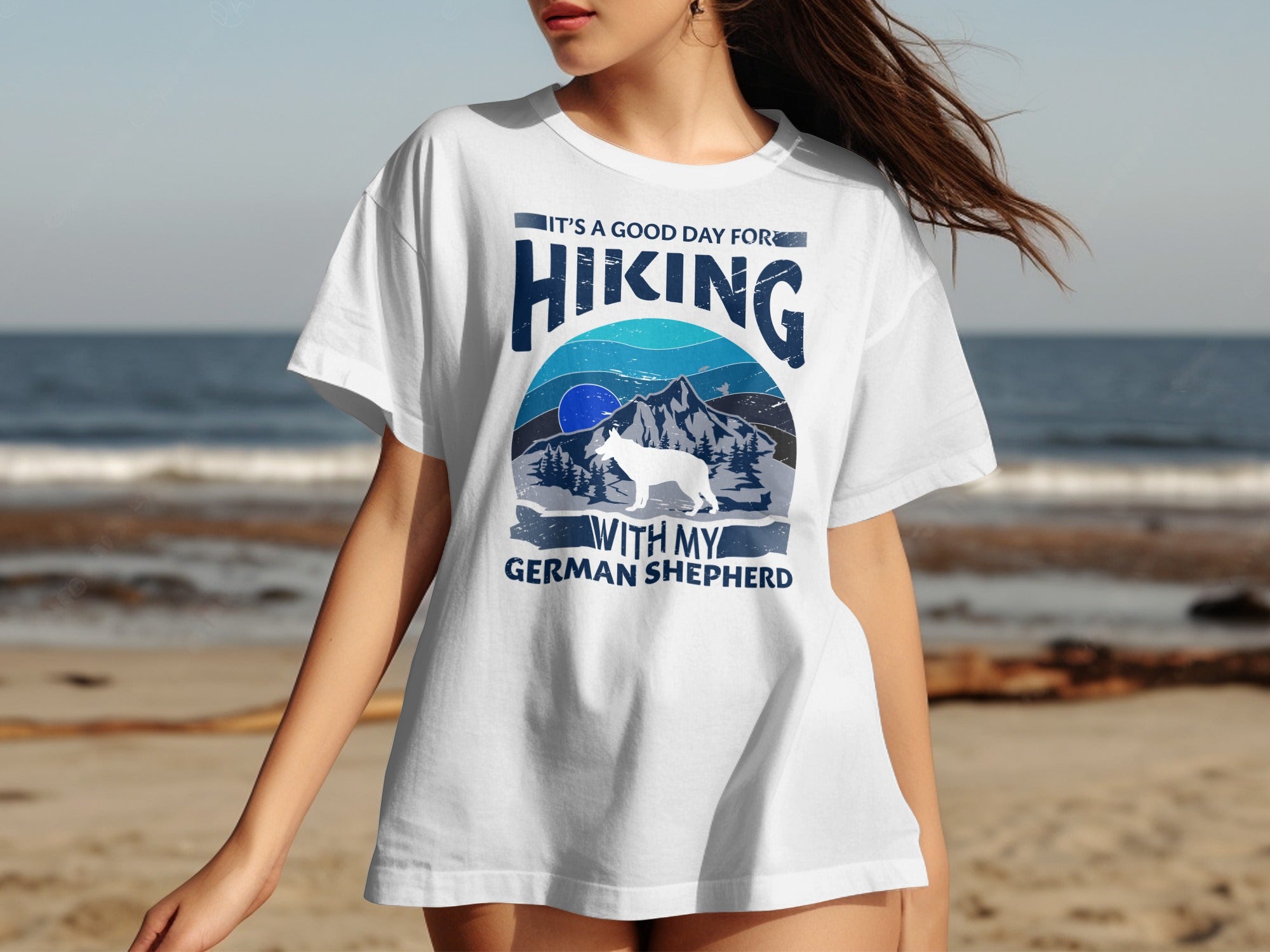 White t-shirt with "It's a good day for hiking with my German Shepherd" text and graphic.