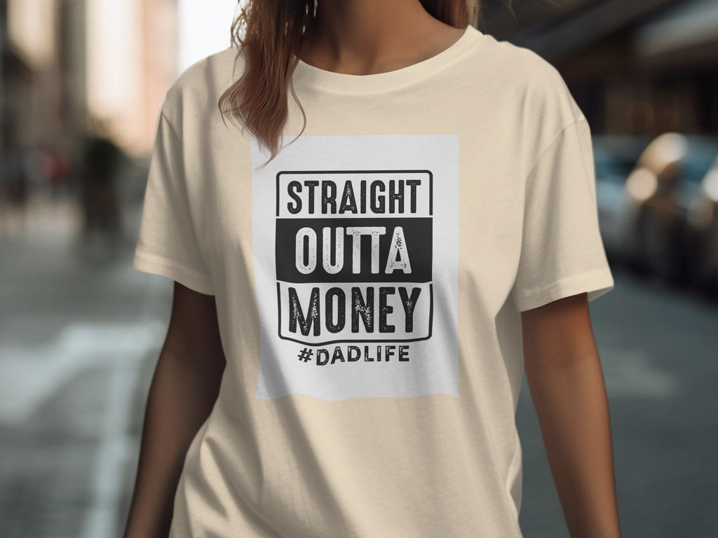 Light beige t-shirt with a graphic reading "STRAIGHT OUTTA MONEY #DADLIFE".