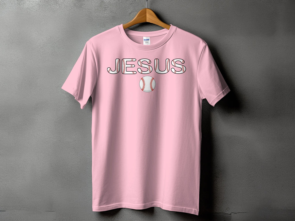 Pink t-shirt with "JESUS" text designed with baseball stitching and a baseball.