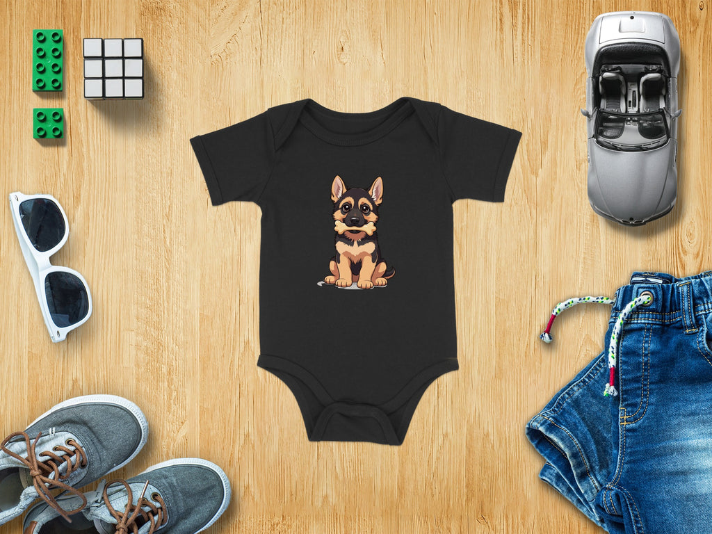 Black baby onesie with a cartoon German Shepherd dog holding a bone.