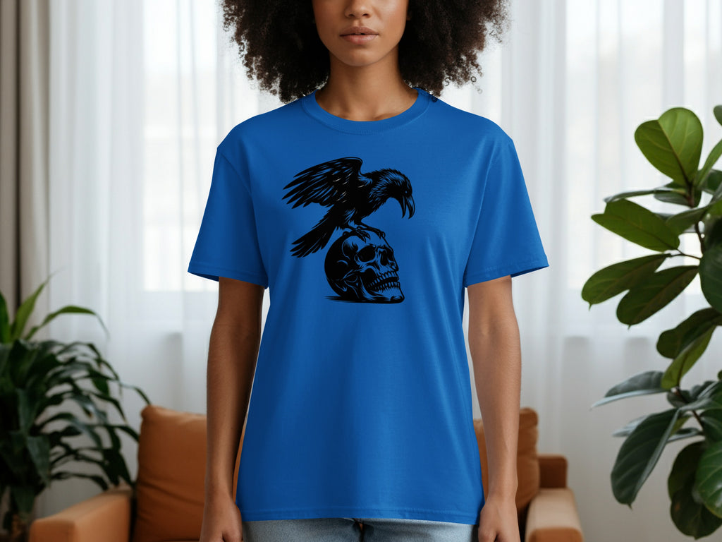 Blue t-shirt with a black crow perched on a skull graphic.